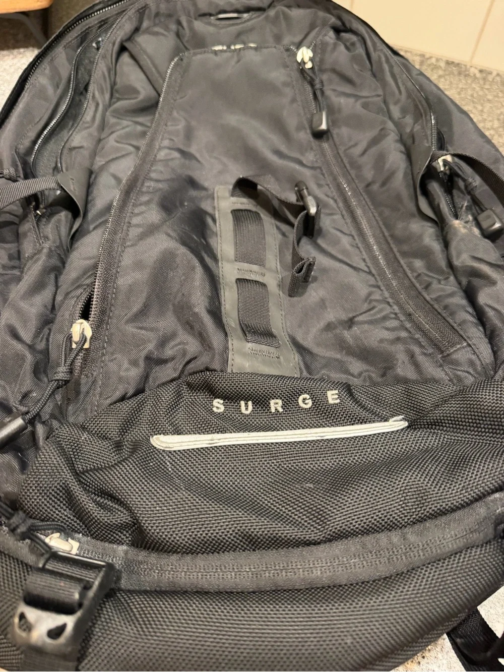 The North Face Black Men's Backpack - Durable Everyday Pack (Surge)
